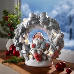 Die moderne Hausfrau LED-Keramikfigur „Santa im Kranz“