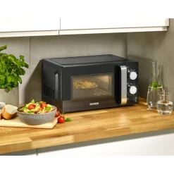 Die moderne Hausfrau Mikrowelle