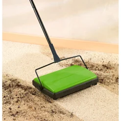 Die moderne Hausfrau Teppichkehrer