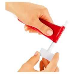 Die moderne Hausfrau Tuben-Roller